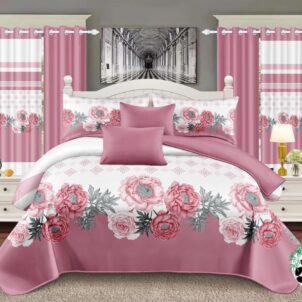 7-piece pink and white floral quilt set displayed in a bedroom, featuring 1 quilt, 2 matching curtains, 2 pillowcases, and 2 cushion cases with a delicate floral design.