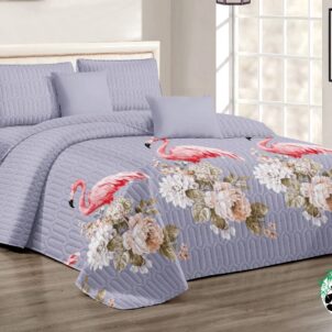 A 5-piece quilt set featuring a light purple quilted pattern adorned with either flamingo or floral designs, bringing a soft and playful charm to the bedroom. The set includes a quilt, matching pillow shams, and decorative cushions, offering a coordinated look that blends elegance with a touch of tropical or botanical flair.