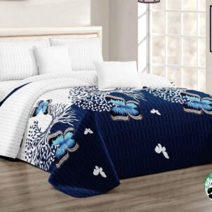 5-piece quilt set featuring a bold blue butterfly design on a white background, includes one quilt, two matching standard pillowcases, and two matching continental pillowcases for a vibrant and coordinated bedroom ensemble.