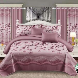 A 7-piece quilt set featuring a delicate pink floral pattern with cherry blossom branches gracefully spread across a soft light pink background. A darker pink wavy pattern runs along the bottom of the quilt, adding contrast and visual interest. The set includes a quilt, matching pillow shams, decorative cushions, and coordinating curtains, creating a serene and romantic atmosphere in the bedroom.