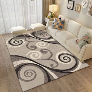 A 2-meter by 1.5-meter carpet featuring a geometric pattern with swirling elements in various shades of grey, accented by splashes of black and white.