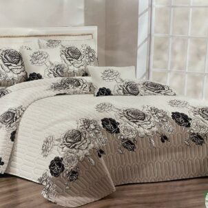 A 5-piece quilt set featuring an elegant floral design in white with subtle black accents, creating a classy and timeless look. The set includes a quilt, matching pillow shams, and decorative cushions, offering a refined yet refreshing addition to any bedroom décor.