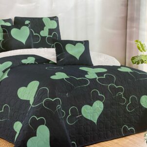 A 5-piece quilt set featuring a bold heart pattern in neon green, contrasted by sections with a reversed design in a dark greyish tone. This modern and playful combination adds vibrant energy and depth to the bedding. The set includes a quilt, matching pillow shams, and decorative cushions for a complete and coordinated look.