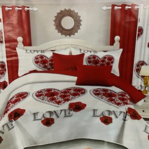 A 7-piece quilt set featuring a white base adorned with red hearts and a delicate rose pattern, complemented by the word 'Love' elegantly printed across the bottom of the quilt. The set includes a quilt, matching pillow shams, decorative cushions, and coordinating curtains, creating a romantic and cohesive bedroom look perfect for expressing warmth and affection.