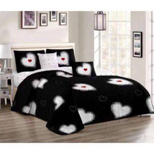Stylish 5-piece quilt set featuring crisp white hearts set against a bold black background, accented with vibrant splashes of red filling some of the hearts for a striking, modern contrast. The set includes a coordinating quilt and matching pillowcases, all showcasing the eye-catching heart design to bring a touch of romance and contemporary flair to any bedroom.
