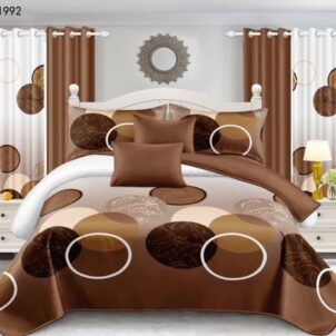A 7-piece quilt set featuring a circular geometric pattern in rich shades of brown, accented with a splash of white for contrast. The modern design adds depth and warmth to the bedroom decor. The set includes a quilt, matching pillow shams, decorative cushions, and coordinating curtains, offering a complete and stylish bedding ensemble.