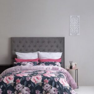 Pierre Cardin duvet cover including 2 pillow cases, crafted with premium fabric for a luxurious feel, featuring an elegant floral design on a dark background that adds sophistication and style to any bedroom decor.