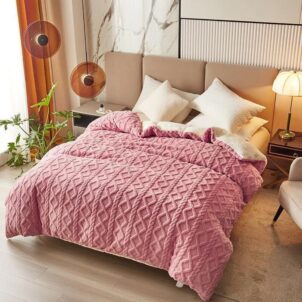 A 5-piece Sherpa comforter set in a cozy pretty pink color, featuring a soft, plush texture perfect for warmth and comfort. The set includes a comforter, matching pillow shams, and decorative cushions, offering a snug and stylish bedding ensemble.