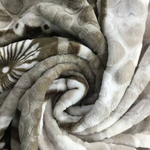 A double size mink blanket in a soft and cozy grey color, crafted with a plush, velvety texture that offers warmth and comfort. The neutral grey tone adds a modern and calming touch, making it a versatile choice for any bedroom or living space.