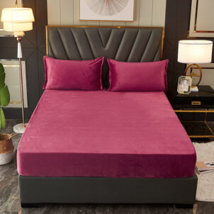 Luxurious three-piece winter velvet bedding set in a soft pink color, designed for double or queen-sized beds. Set includes one plush, fitted sheet with deep pockets for a snug fit and two matching standard-size pillowcases. Made from warm, ultra-soft velvet fabric, perfect for cozy comfort during colder months, adding a touch of elegance and warmth to any bedroom.