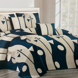 Quilt featuring an elegant green blue pattern, offering a crisp and sophisticated look for a refined bedroom setting.