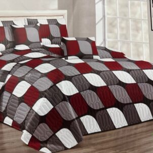 Quilt set with matching pillowcases in bold, vibrant colors and elegant patterns, creating a stylish and eye-catching bedroom look.