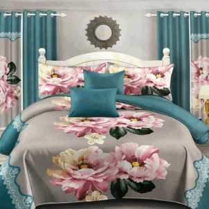 Quilt set adorned with bold, oversized pink roses and subtle turquoise accents. The vibrant floral design adds a fresh, elegant touch, blending classic charm with a modern flair