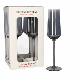 Set of elegant champagne flutes with slender stems and crystal-clear glass, arranged neatly on a formal dinner table. Perfect for toasting at a sophisticated dinner party or celebration