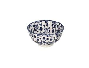 Individual white ceramic plates and bowls with a delicate blue floral pattern and a thin blue border.