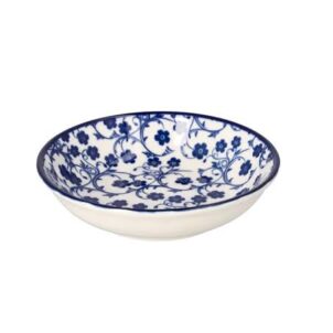 Individual white ceramic plates and bowls with a delicate blue floral pattern and a thin blue border.