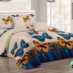 Quilt set with matching pillowcases in bold, vibrant colors and elegant patterns, creating a stylish and eye-catching bedroom look.