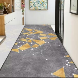 Modern carpet with a geometric design of bold yellow triangles, adding brightness to any room.