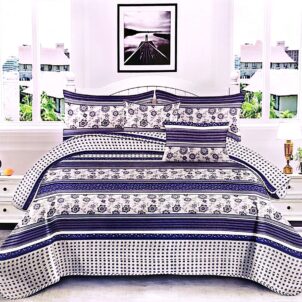Navy and white quilt featuring floral patterns for a classic, fresh look.