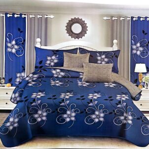 Blue quilt with a light blue floral pattern for a soft, calming look.