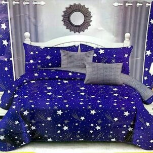 Bold blue bedspread set featuring white star patterns, creating a striking and celestial design.
