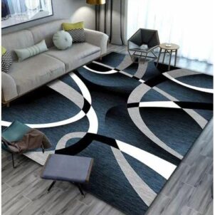 Carpet with white, grey and touches of black circle patterns.