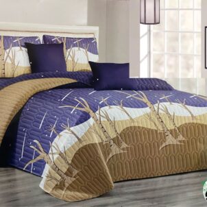 Purple quilt with brown tree pattern, accented by light brown and natural tones for a warm, earthy look.