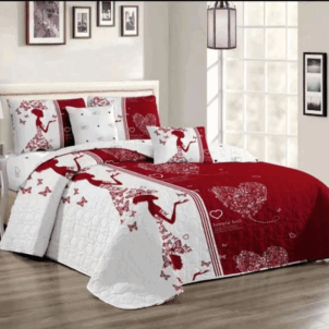 A white and red quilt with a dramatic design featuring the outline of a woman wearing a butterfly-patterned dress, blending abstract and figurative elements.