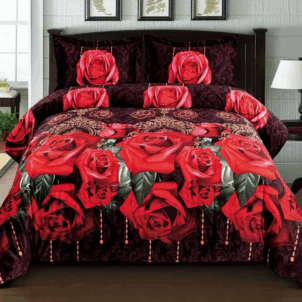 A black quilt adorned with bold, dramatic red roses and vibrant green leaves.