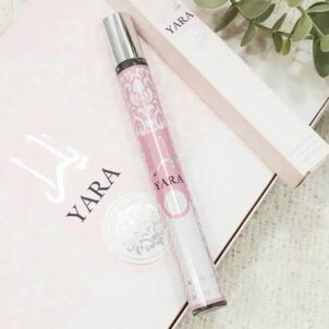 Bottle of Yara perfume for women, featuring a soft pink design with a gold cap