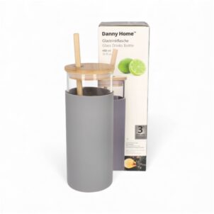 Glass drinking bottle with a flexible silicone sleeve for grip and protection, paired with a reusable straw for convenient hydration.