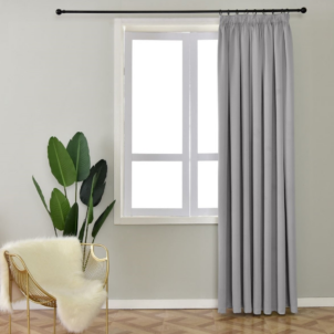 Beautiful, soft grey curtain designed to enhance and elevate the look of any room.