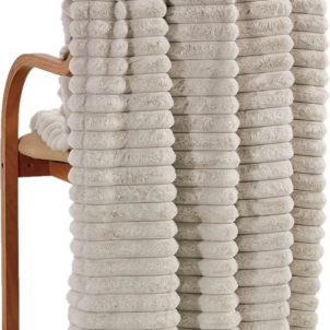 Premium striped faux rabbit fur blanket with a soft, luxurious feel, perfect for cozy movie nights in the bedroom or living room.