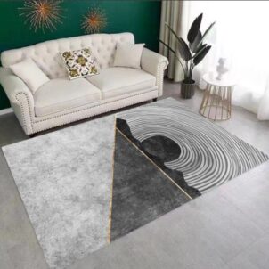 A three-dimensional carpet featuring bold patterns and vibrant, eye-catching colors that create a striking, textured visual effect.